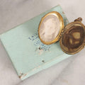 Lot 015 - Antique Victorian Gilt Metal Hair Locket With Turquoise Glass Cabochons, Portrait Photograph And Hair Keepsake, In Taylor's Diamonds Box