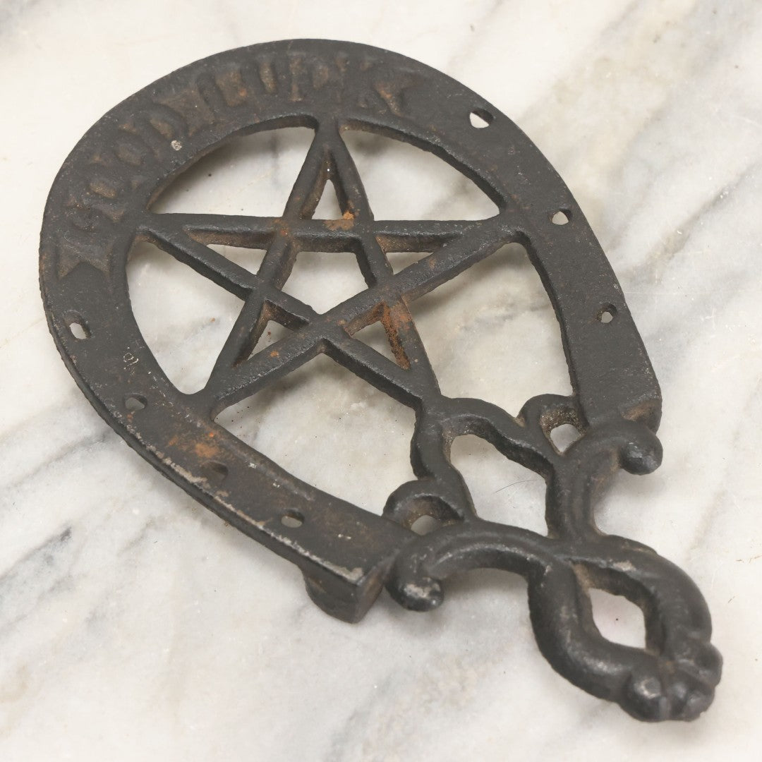 Lot 030 - Vintage Cast Iron Trivet With Pentagram Design And "Good Luck" Inscription