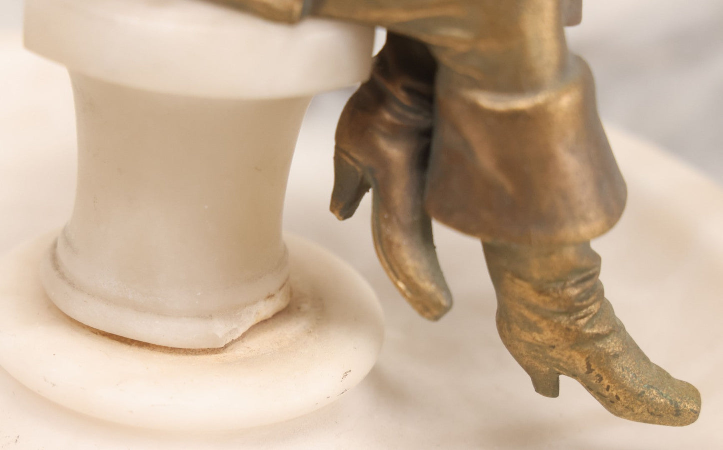 Lot 082 - Antique Alabaster Ashtray With Metal Female Pirate Figure Seated On Pedestal, Note Loss To Pedestal Base, Loosening Bolt