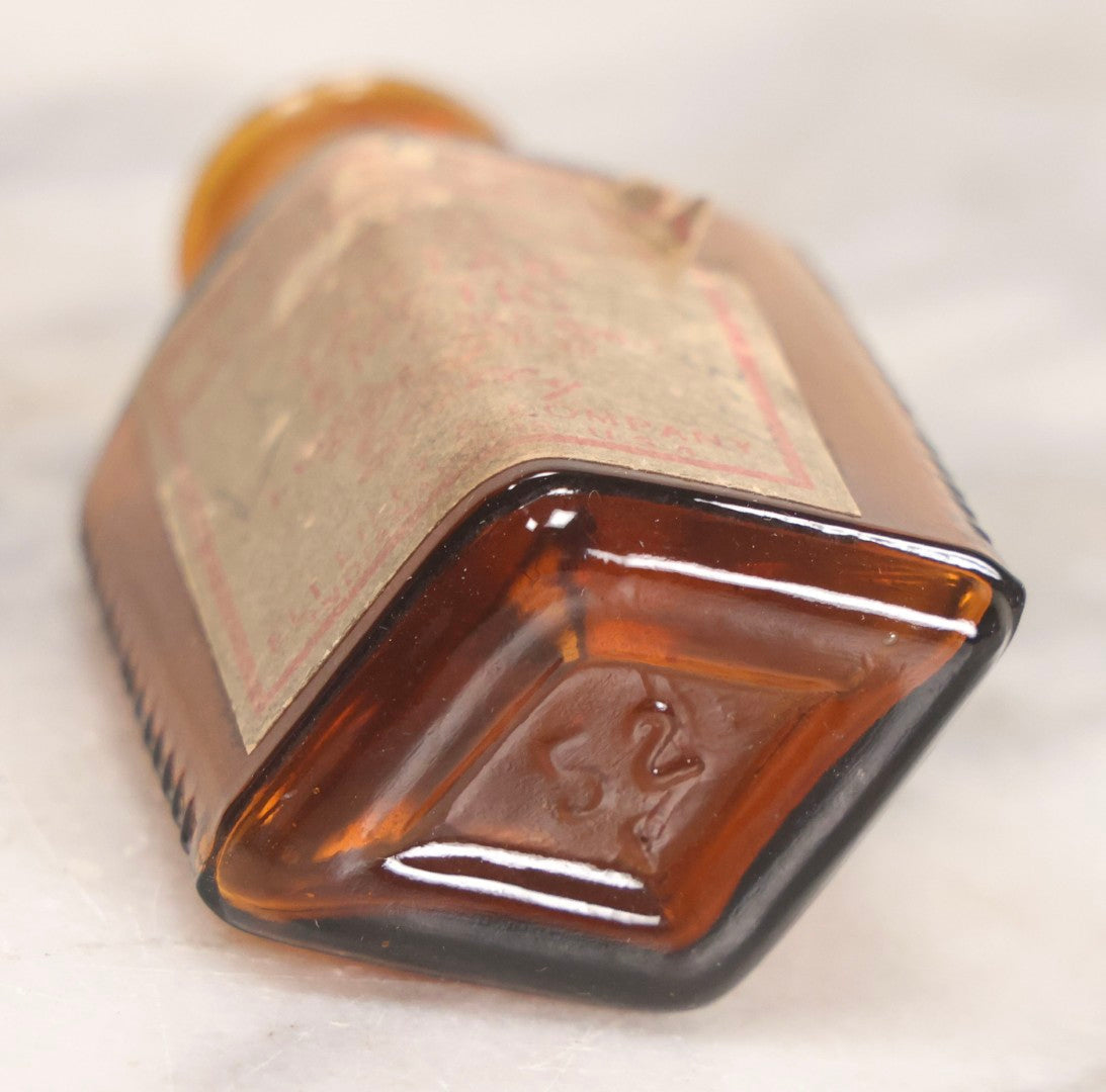 Lot 084 - Amber Poison Bottle With Poison Ribs, Tartar Emetic Paper Label, Eli Lilly & Co., Indianapolis, Indiana