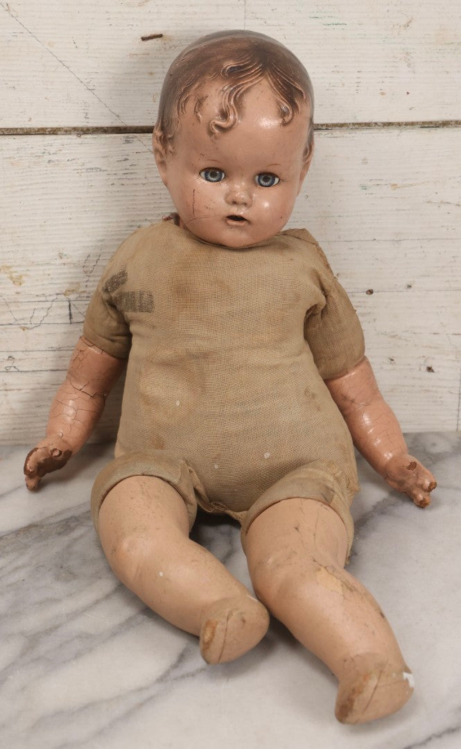 Lot 094 - Trio Of Vintage Composition Baby Dolls Including Floral Dress, Sheer Gown With Bonnet, And Plain Tan Undergarment