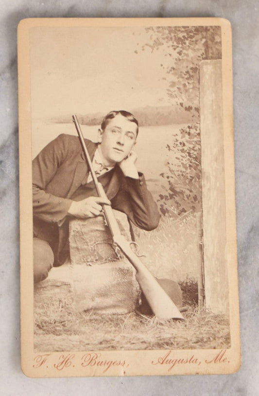 Lot 143 - Antique Carte De Visite CDV Photograph Of Young Man With Rifle, Outdoor Studio Scene, Photographed By F.H. Burgess, Augusta, Maine