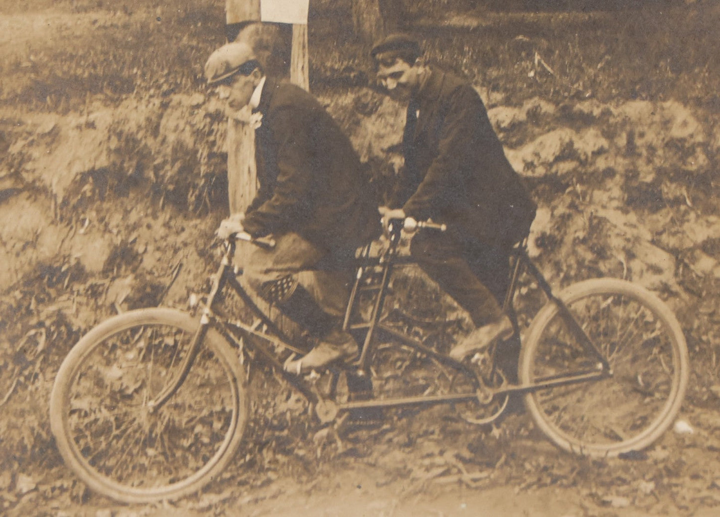 Lot 162 - Antique Boarded Photograph Of Two Young Men In Hats Riding A Tandem Bicycle