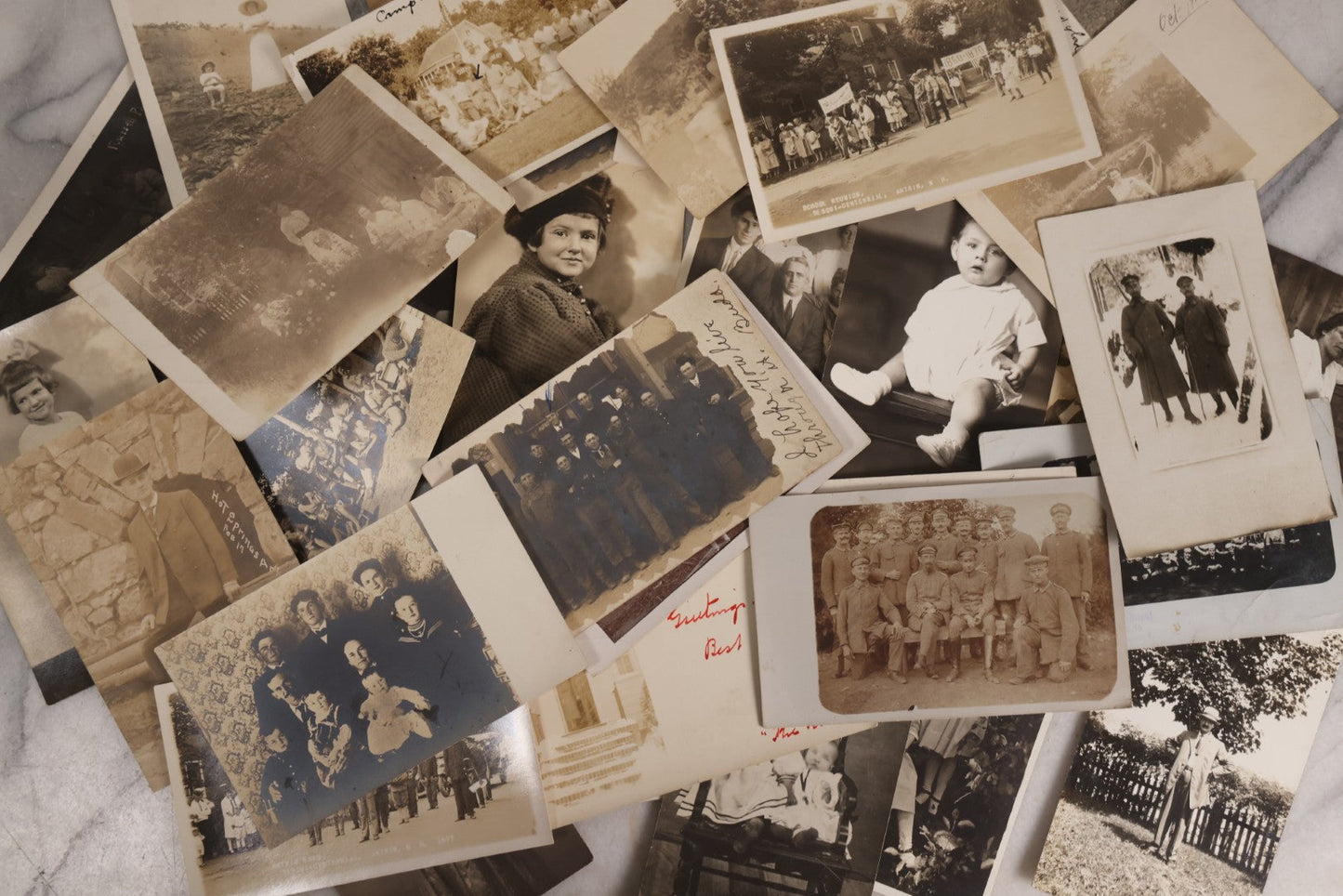 Lot 231 - Grouping Of 38 Antique Real Photo Postcards R.P.P.C.. Featuring People And Portraits Including Soldiers, Workers, Parade Scenes, Men, Women, And Children, Early 20th Century