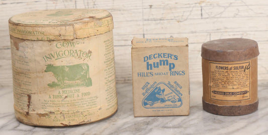 Lot 269 - Trio Of Antique And Vintage Advertising Boxes Including Cow Invigorator, Deckor Hump Pig Rings With Contents, And Flowers Of Sulfur Apothecary Box