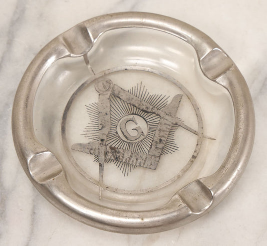 Lot 012 - Vintage Masonic Glass Ashtray With Silver Colored Overlay And Square And Compass Design, 6" Diameter