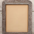 Lot 054 - Antique French Silvered Bronze Picture Frame With Repoussé Floral Scrollwork And Figural Scenes, With Glass, Circa Early 20th Century, 10-3/4" x 13-1/2"