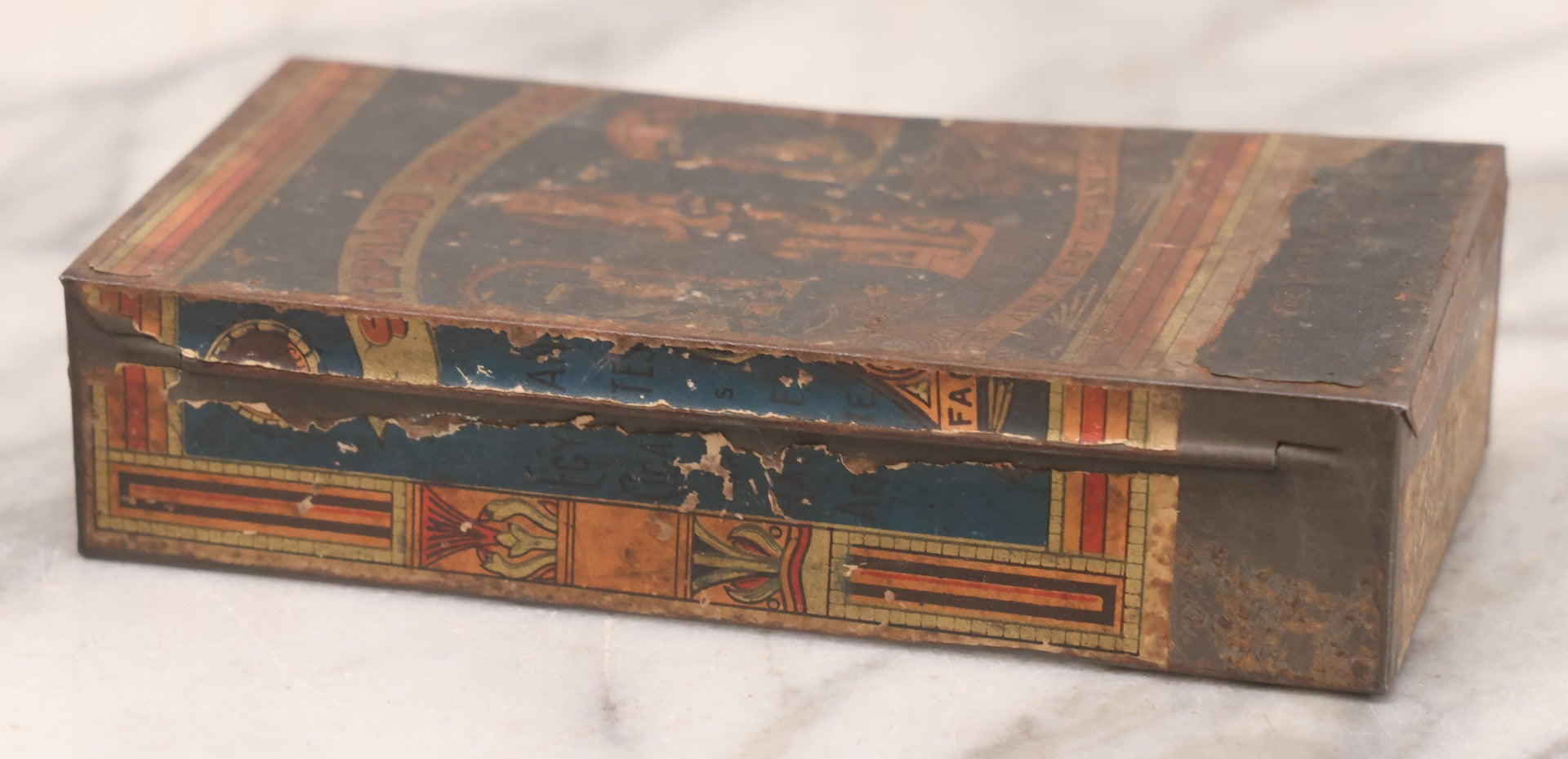 Lot 106 - Antique Stephano Brothers Paper Covered Egyptian Cigarette Tin For Ramses II Cigarettes, Manufactured From Yenidj Turkish Tobacco, Philadelphia, Pennsylvania