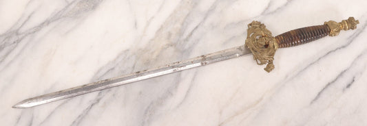 Lot 157 - Vintage Decorative Dress Sword With Ornate Cast Brass Guard, Anchor Motif, Ribbed Leather Grip, And Lion Head Quillons, 22" L With 15-5/8" Blade