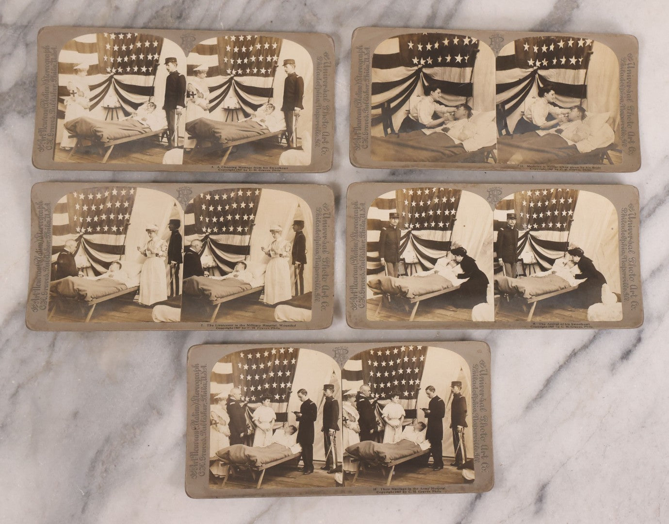Lot 173 - Grouping Of Five Antique Stereo View Cards, Romantic Scenes Of Wounded Soldier In Bed Before American Flag, Art Nouveau (Platino) Stereograph Cards Published By Universal Photo Art Co., Copyright C.H. Graves, Publisher, 1907, Philadelphia