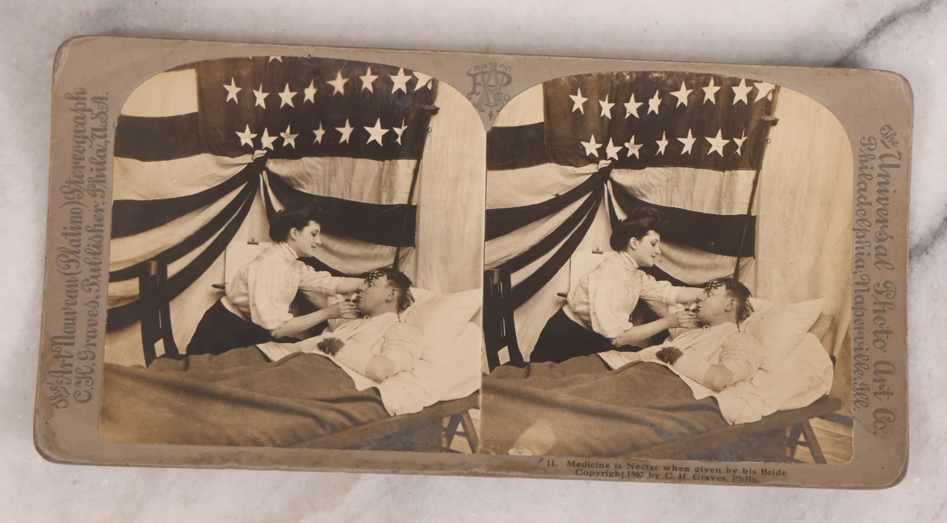 Lot 173 - Grouping Of Five Antique Stereo View Cards, Romantic Scenes Of Wounded Soldier In Bed Before American Flag, Art Nouveau (Platino) Stereograph Cards Published By Universal Photo Art Co., Copyright C.H. Graves, Publisher, 1907, Philadelphia