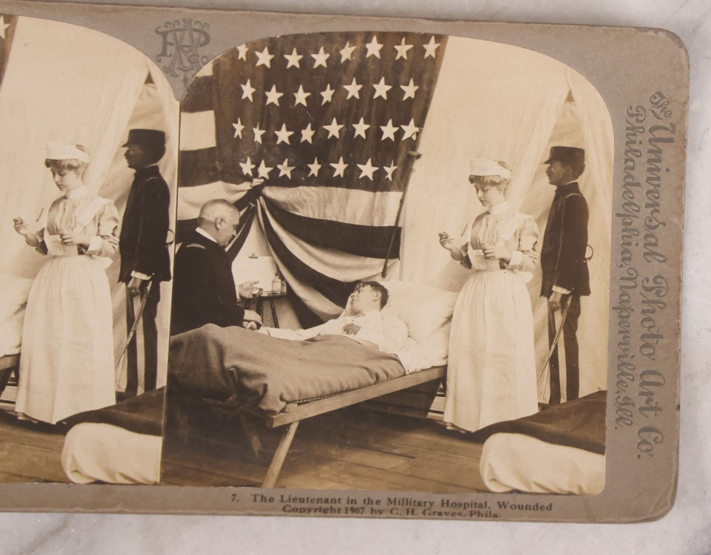 Lot 173 - Grouping Of Five Antique Stereo View Cards, Romantic Scenes Of Wounded Soldier In Bed Before American Flag, Art Nouveau (Platino) Stereograph Cards Published By Universal Photo Art Co., Copyright C.H. Graves, Publisher, 1907, Philadelphia