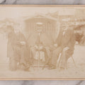 Lot 179 - Antique Board-Mounted Photograph Of Three Mustachioed Men Posed On Beach In Suits With Capes And Walking Sticks Before Striped Beach Windbreak, Westerland, Sylt, Photographed By A. Gabel
