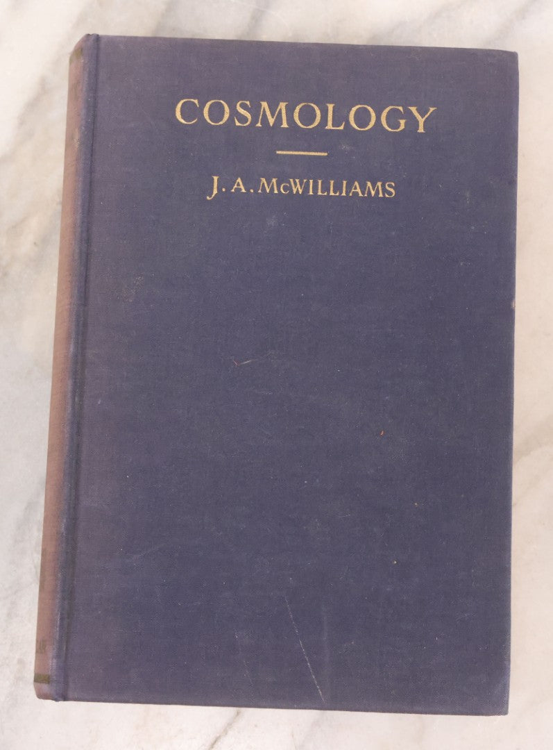 Lot 231 - "Cosmology: A Text For Colleges" Vintage Cosmology Textbook By J. A. McWilliams, Published By The Macmillan Company, New York, 1938