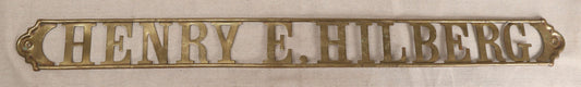 Lot 032 - Antique Brass Name Sign From The E. Hilberg Shaving Parlor, Henry E. Hilberg (1849-1931), Barber, Beaver Falls, Pennsylvania