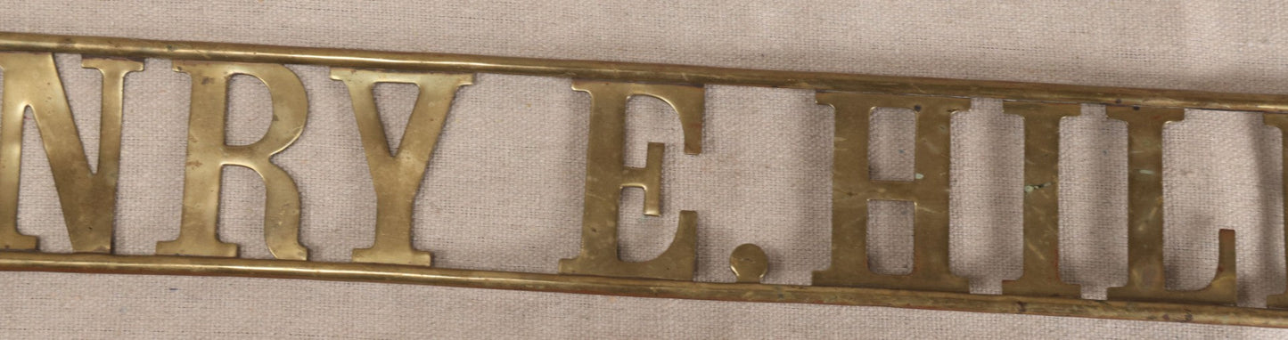 Lot 032 - Antique Brass Name Sign From The E. Hilberg Shaving Parlor, Henry E. Hilberg (1849-1931), Barber, Beaver Falls, Pennsylvania