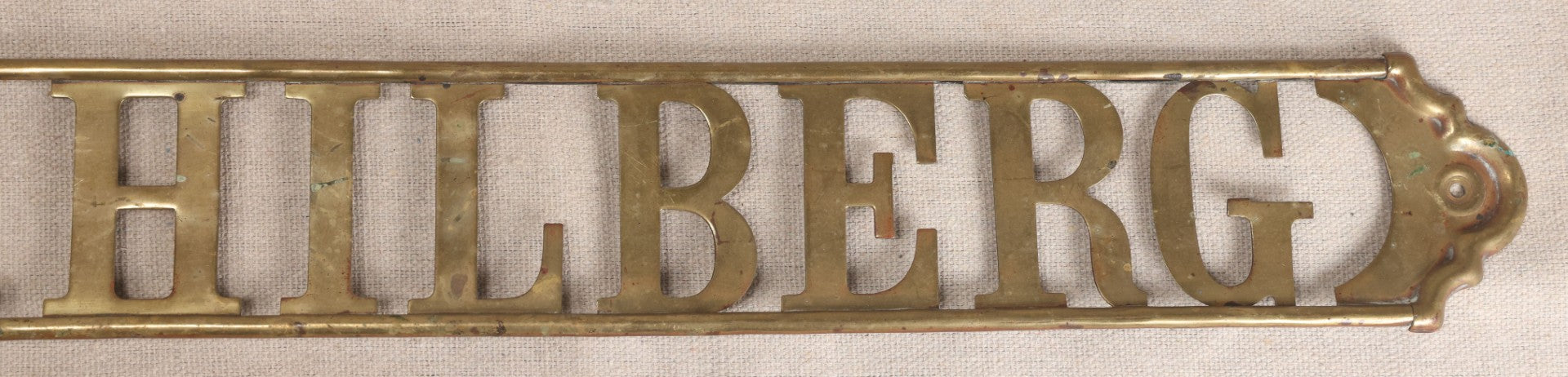 Lot 032 - Antique Brass Name Sign From The E. Hilberg Shaving Parlor, Henry E. Hilberg (1849-1931), Barber, Beaver Falls, Pennsylvania