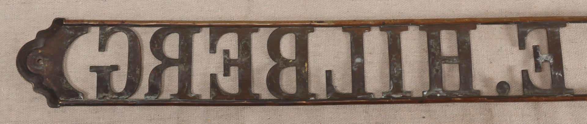 Lot 032 - Antique Brass Name Sign From The E. Hilberg Shaving Parlor, Henry E. Hilberg (1849-1931), Barber, Beaver Falls, Pennsylvania