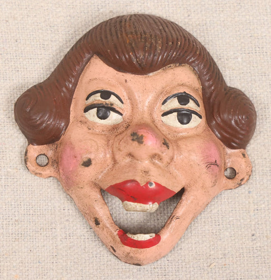 Lot 039 - Vintage Painted Cast Iron Four-Eyed Lady Figural Wall Mount Bottle Opener