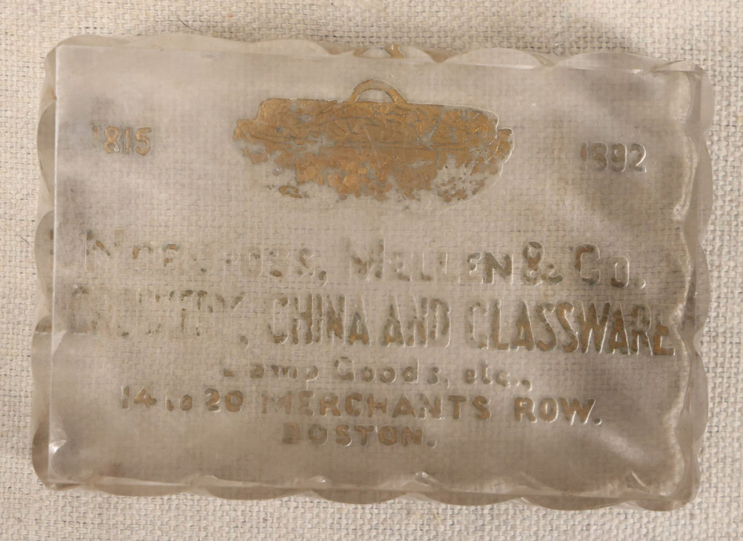 Lot 051 - Antique Reverse-Painted Glass Advertising Paperweight For Norcross, Mellen & Co., Crockery, China And Glassware, Lamp Goods, 14 To 20 Merchants Row, Boston, Massachusetts, 1815-1892