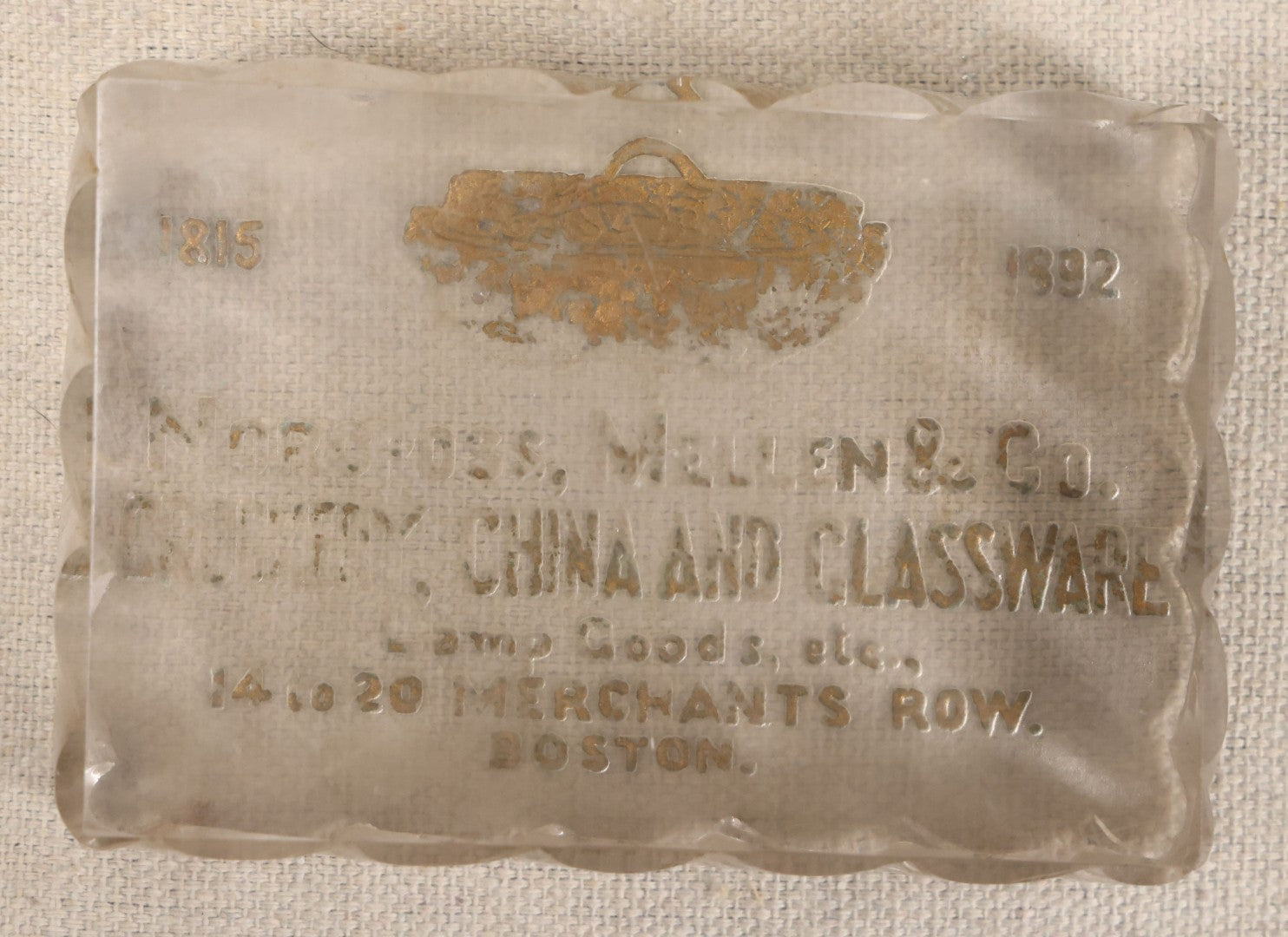 Lot 051 - Antique Reverse-Painted Glass Advertising Paperweight For Norcross, Mellen & Co., Crockery, China And Glassware, Lamp Goods, 14 To 20 Merchants Row, Boston, Massachusetts, 1815-1892