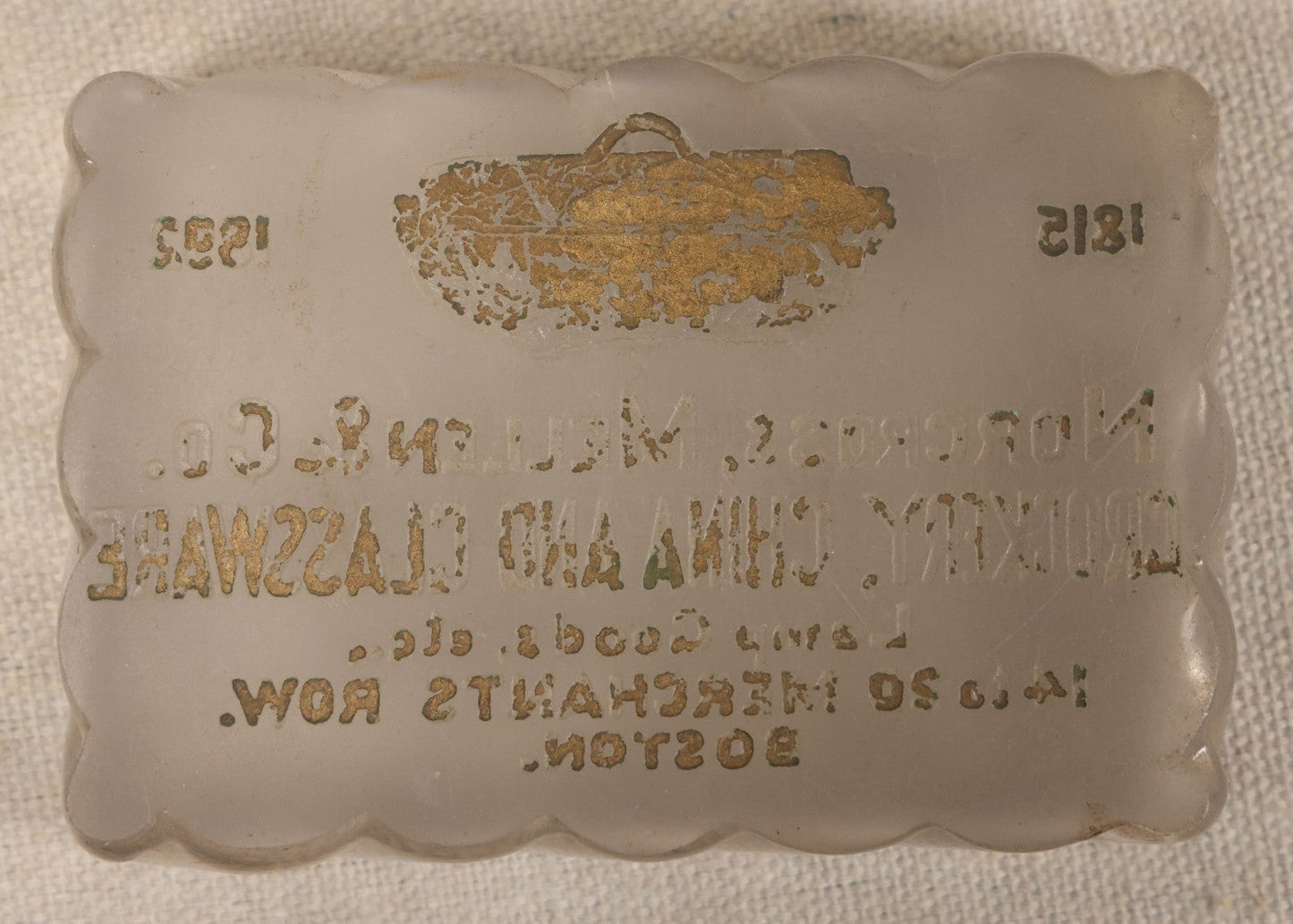 Lot 051 - Antique Reverse-Painted Glass Advertising Paperweight For Norcross, Mellen & Co., Crockery, China And Glassware, Lamp Goods, 14 To 20 Merchants Row, Boston, Massachusetts, 1815-1892