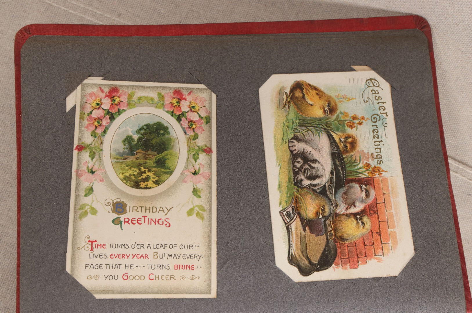 Lot 054 - Antique Postcard Album With Red Cover Containing Approximately 150 Antique And Vintage Postcards, New England, Holidays Including Christmas And Easter, Domestic, And International Subjects