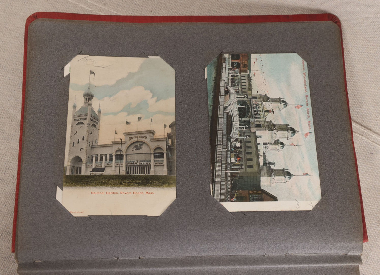 Lot 054 - Antique Postcard Album With Red Cover Containing Approximately 150 Antique And Vintage Postcards, New England, Holidays Including Christmas And Easter, Domestic, And International Subjects