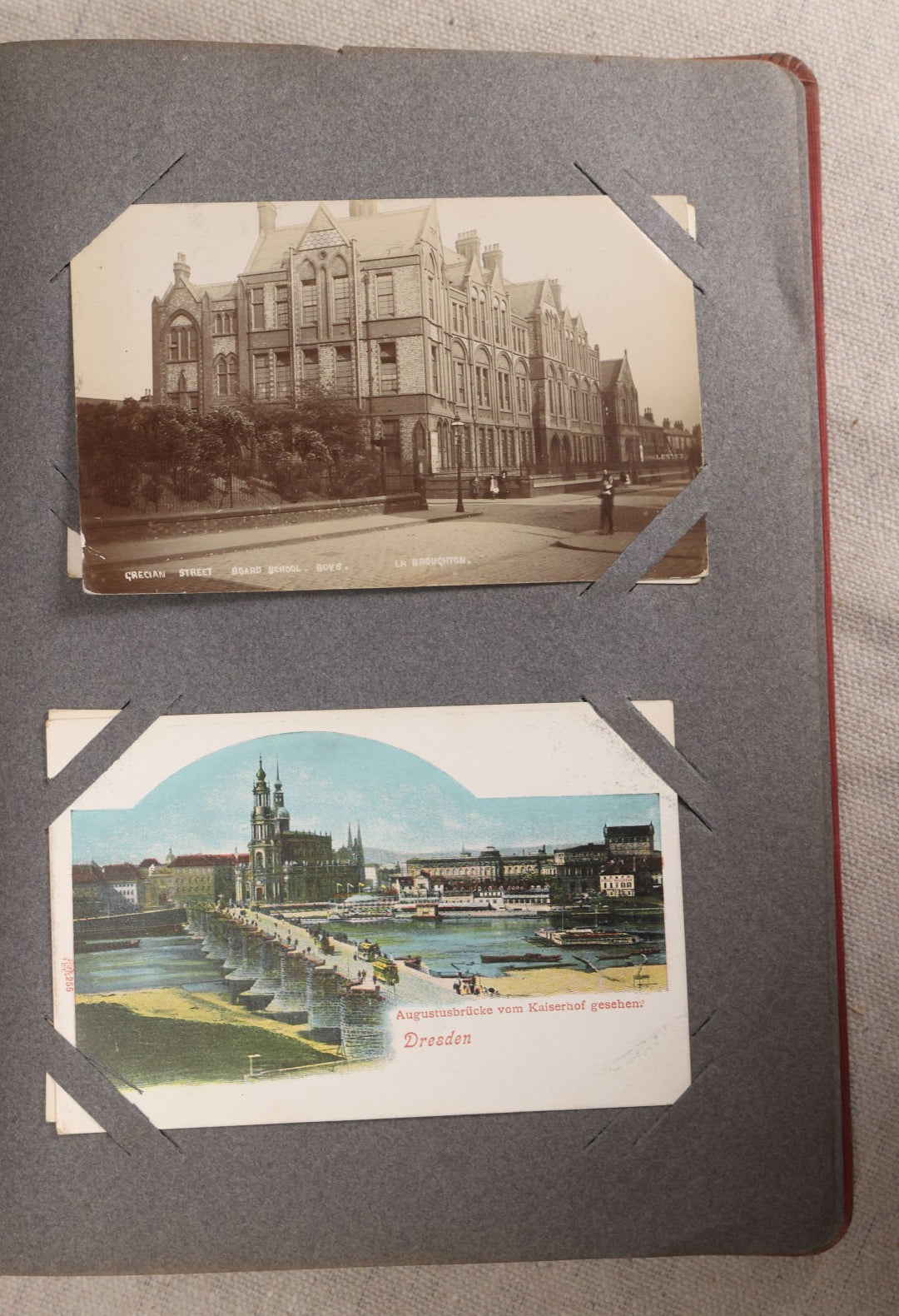 Lot 054 - Antique Postcard Album With Red Cover Containing Approximately 150 Antique And Vintage Postcards, New England, Holidays Including Christmas And Easter, Domestic, And International Subjects