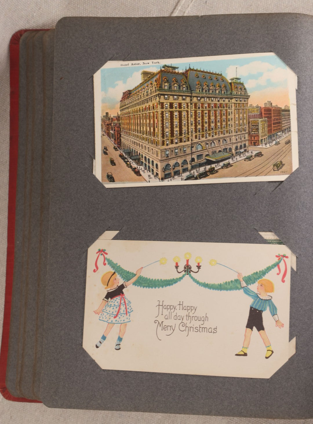 Lot 054 - Antique Postcard Album With Red Cover Containing Approximately 150 Antique And Vintage Postcards, New England, Holidays Including Christmas And Easter, Domestic, And International Subjects