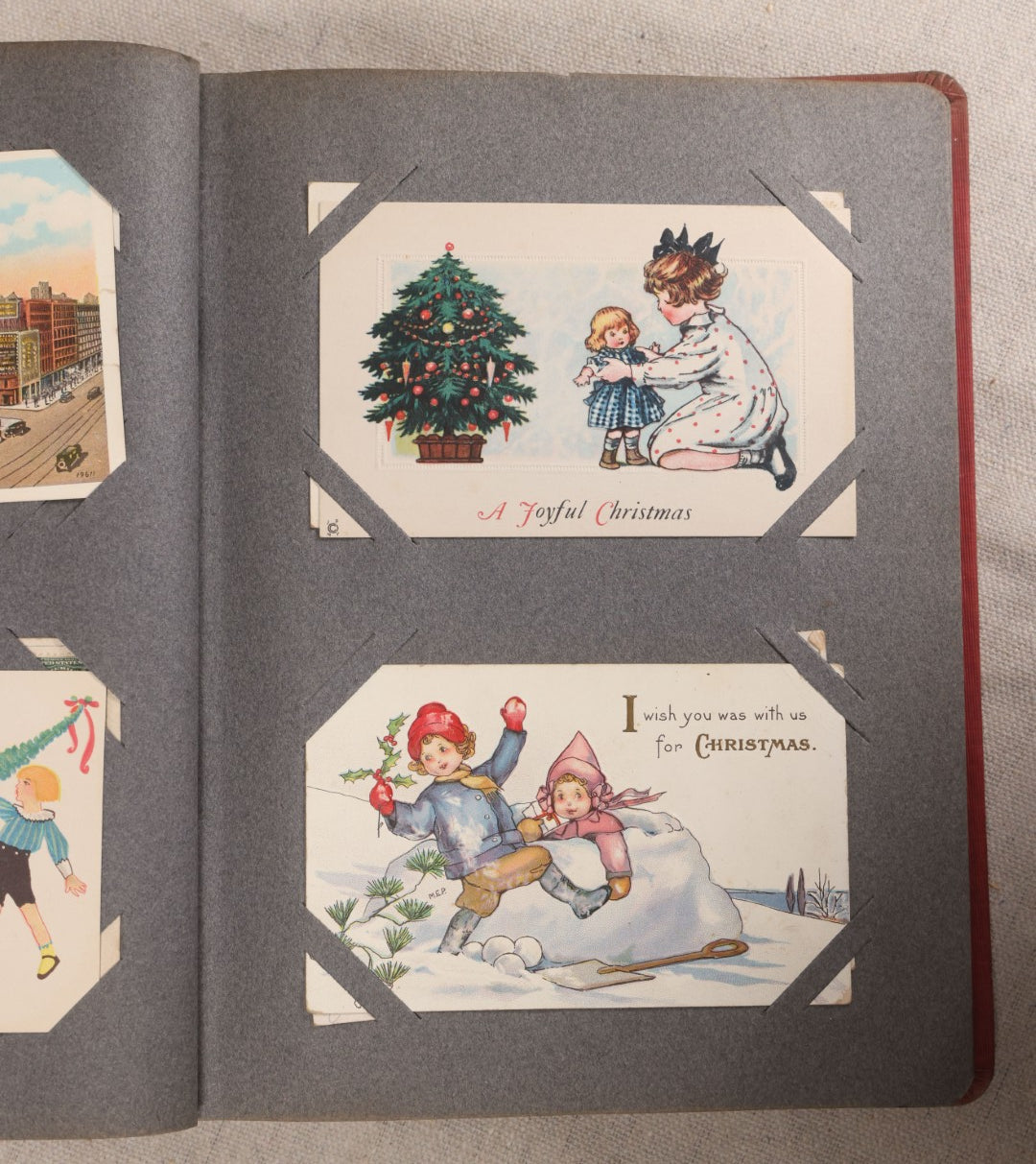 Lot 054 - Antique Postcard Album With Red Cover Containing Approximately 150 Antique And Vintage Postcards, New England, Holidays Including Christmas And Easter, Domestic, And International Subjects