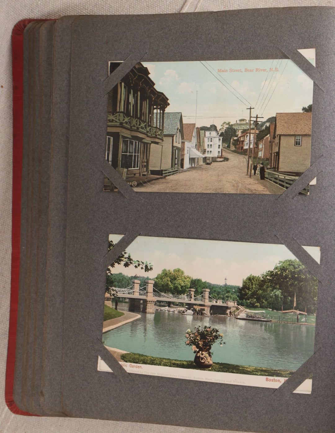 Lot 054 - Antique Postcard Album With Red Cover Containing Approximately 150 Antique And Vintage Postcards, New England, Holidays Including Christmas And Easter, Domestic, And International Subjects