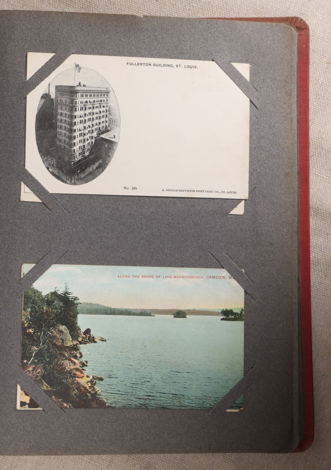 Lot 054 - Antique Postcard Album With Red Cover Containing Approximately 150 Antique And Vintage Postcards, New England, Holidays Including Christmas And Easter, Domestic, And International Subjects