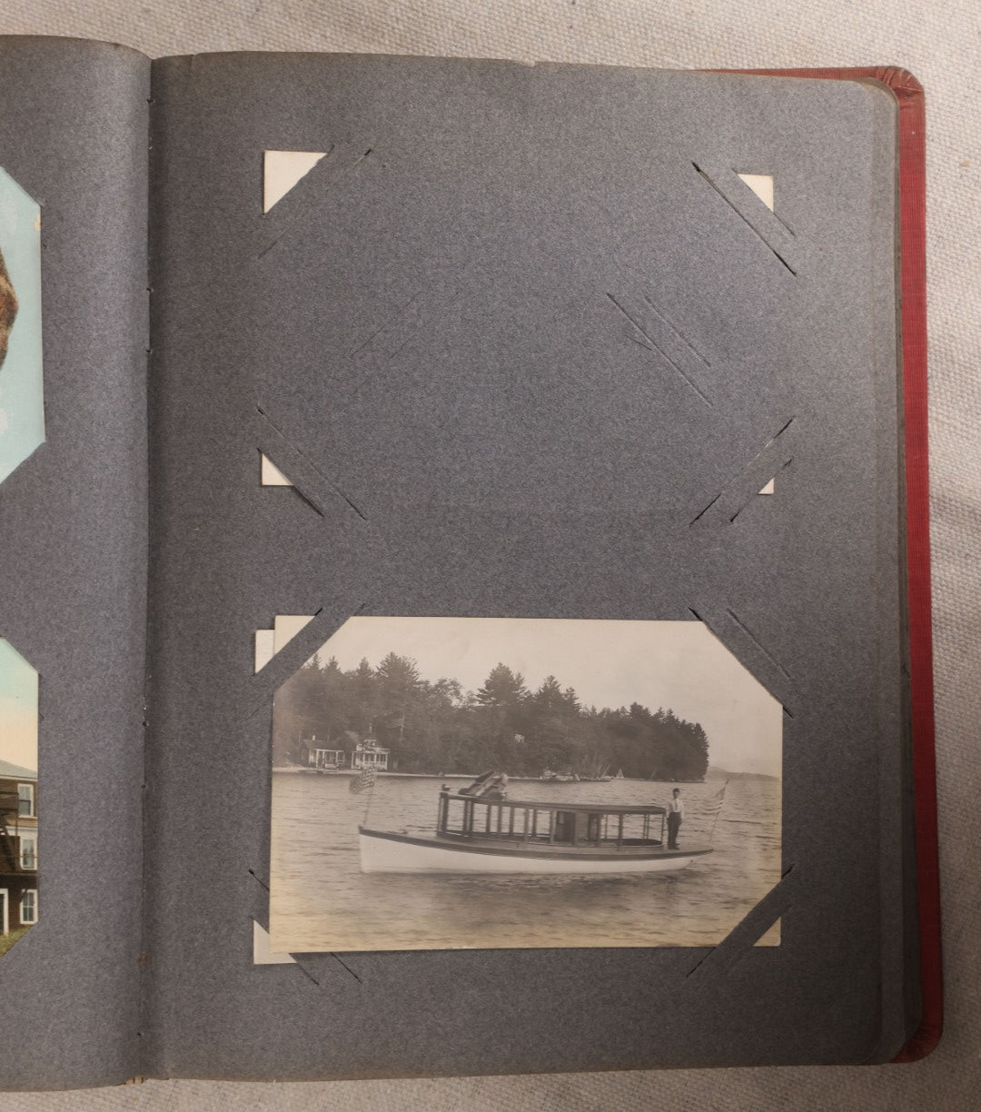 Lot 054 - Antique Postcard Album With Red Cover Containing Approximately 150 Antique And Vintage Postcards, New England, Holidays Including Christmas And Easter, Domestic, And International Subjects