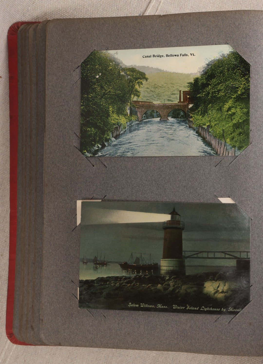Lot 054 - Antique Postcard Album With Red Cover Containing Approximately 150 Antique And Vintage Postcards, New England, Holidays Including Christmas And Easter, Domestic, And International Subjects