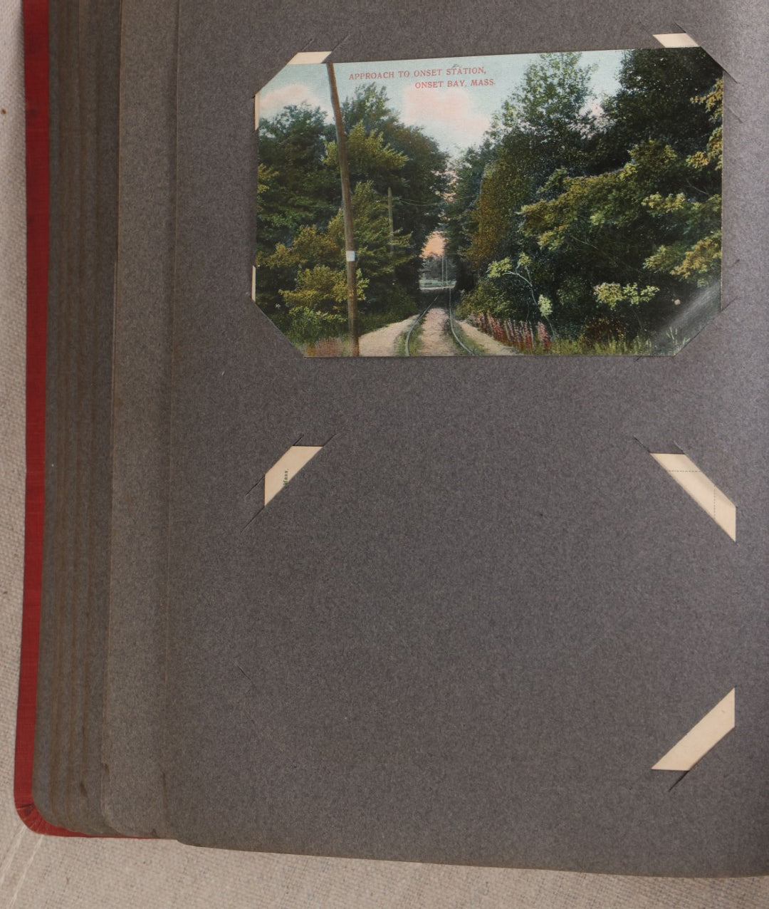 Lot 054 - Antique Postcard Album With Red Cover Containing Approximately 150 Antique And Vintage Postcards, New England, Holidays Including Christmas And Easter, Domestic, And International Subjects
