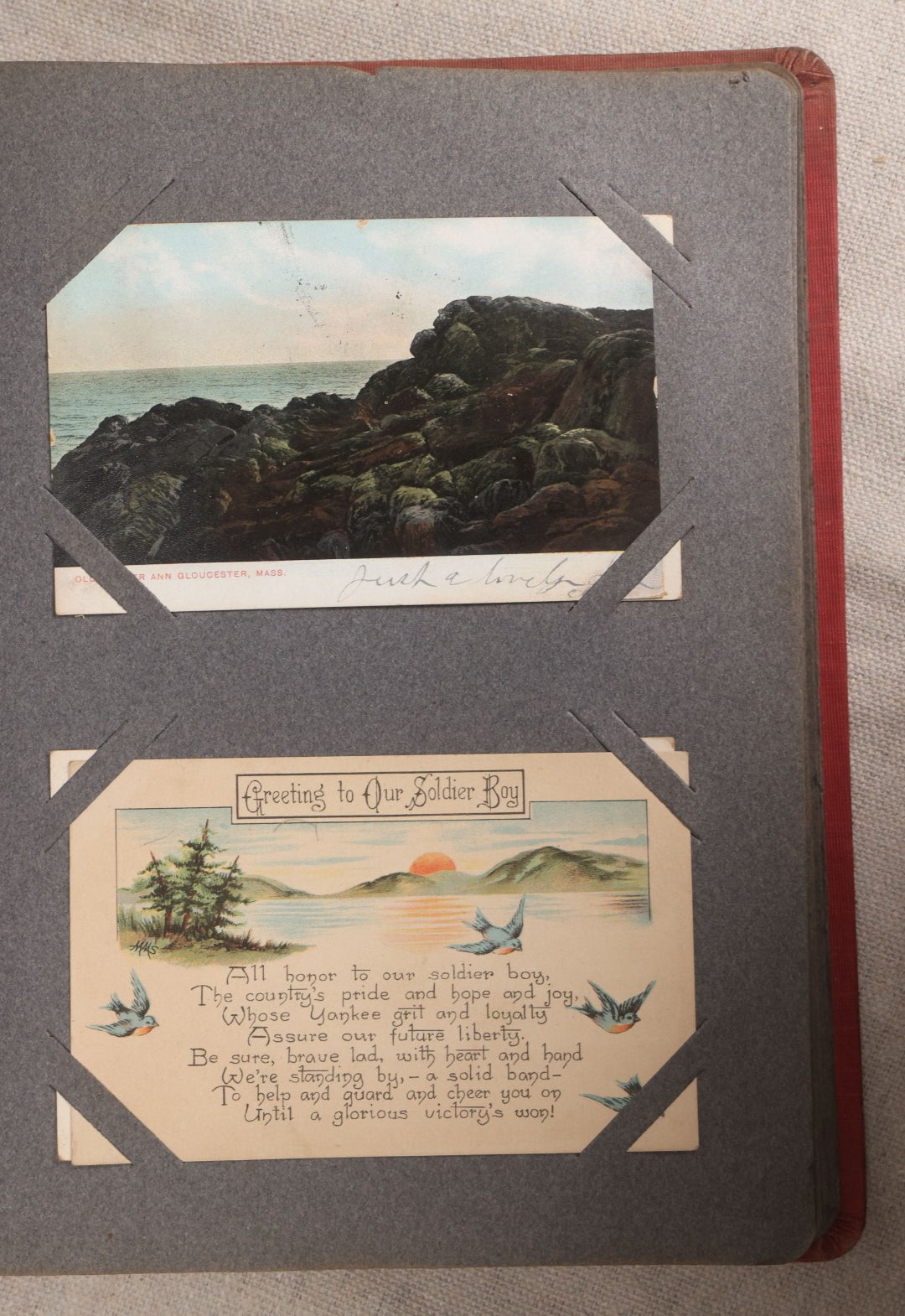 Lot 054 - Antique Postcard Album With Red Cover Containing Approximately 150 Antique And Vintage Postcards, New England, Holidays Including Christmas And Easter, Domestic, And International Subjects
