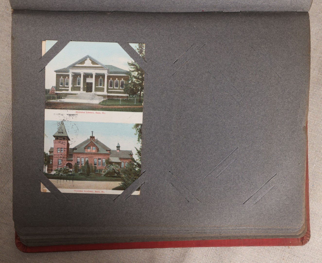 Lot 054 - Antique Postcard Album With Red Cover Containing Approximately 150 Antique And Vintage Postcards, New England, Holidays Including Christmas And Easter, Domestic, And International Subjects