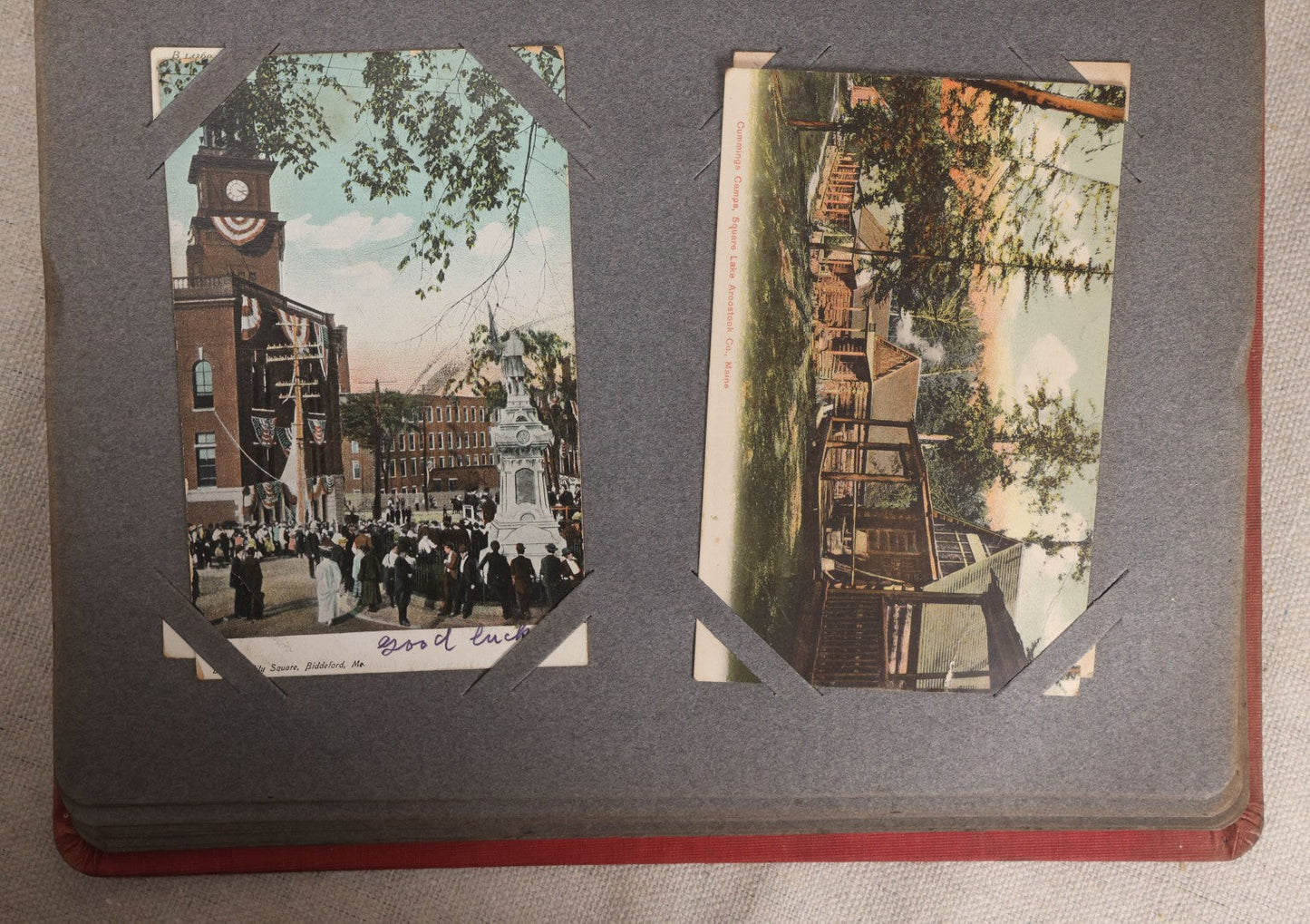 Lot 054 - Antique Postcard Album With Red Cover Containing Approximately 150 Antique And Vintage Postcards, New England, Holidays Including Christmas And Easter, Domestic, And International Subjects