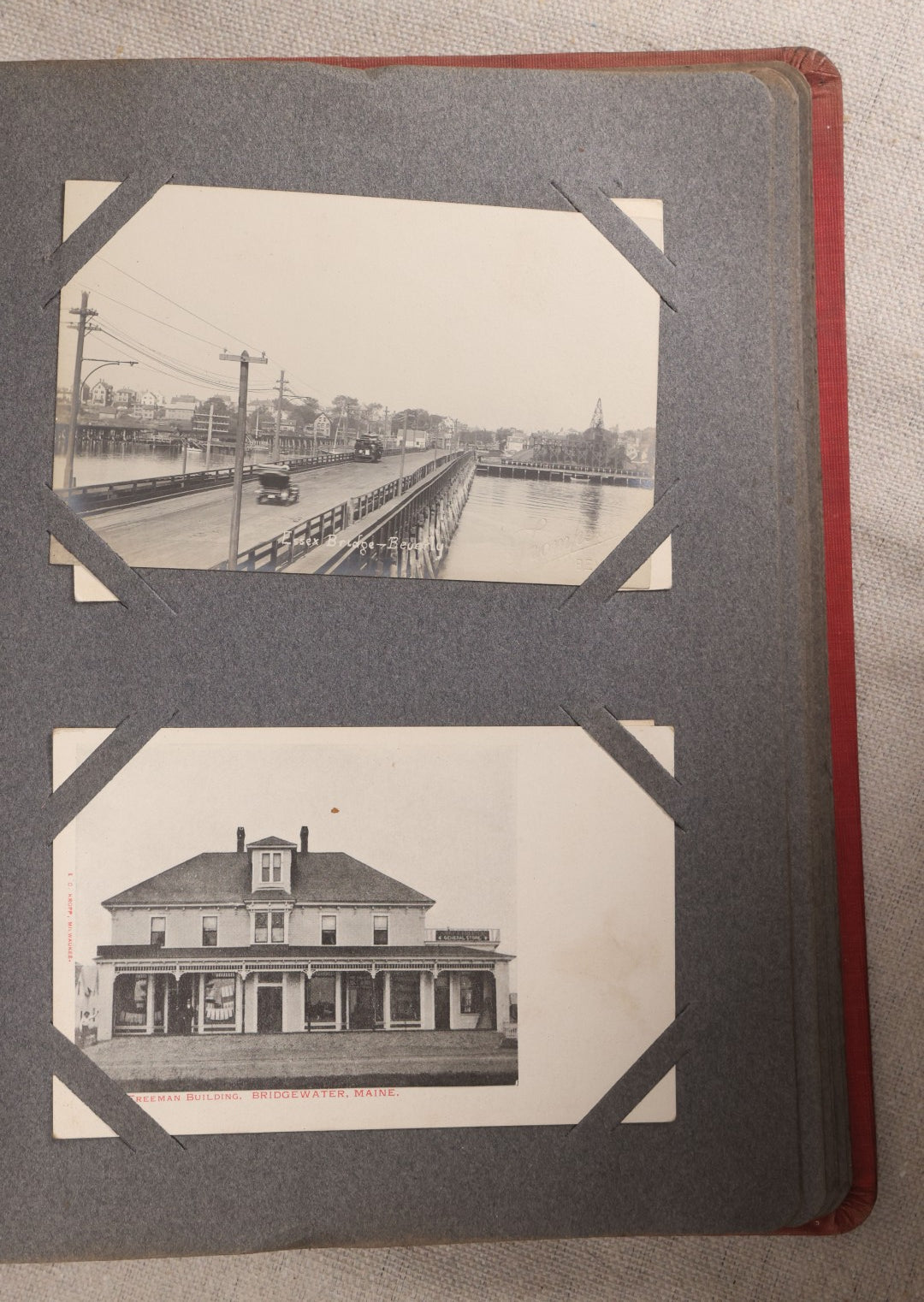 Lot 054 - Antique Postcard Album With Red Cover Containing Approximately 150 Antique And Vintage Postcards, New England, Holidays Including Christmas And Easter, Domestic, And International Subjects