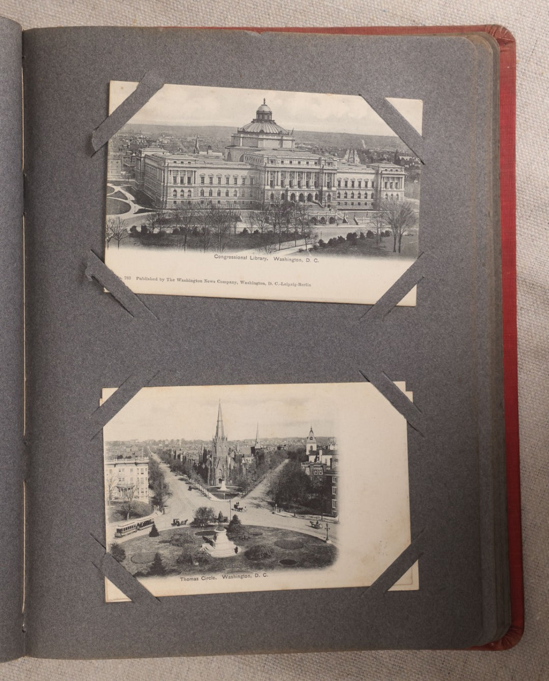 Lot 054 - Antique Postcard Album With Red Cover Containing Approximately 150 Antique And Vintage Postcards, New England, Holidays Including Christmas And Easter, Domestic, And International Subjects