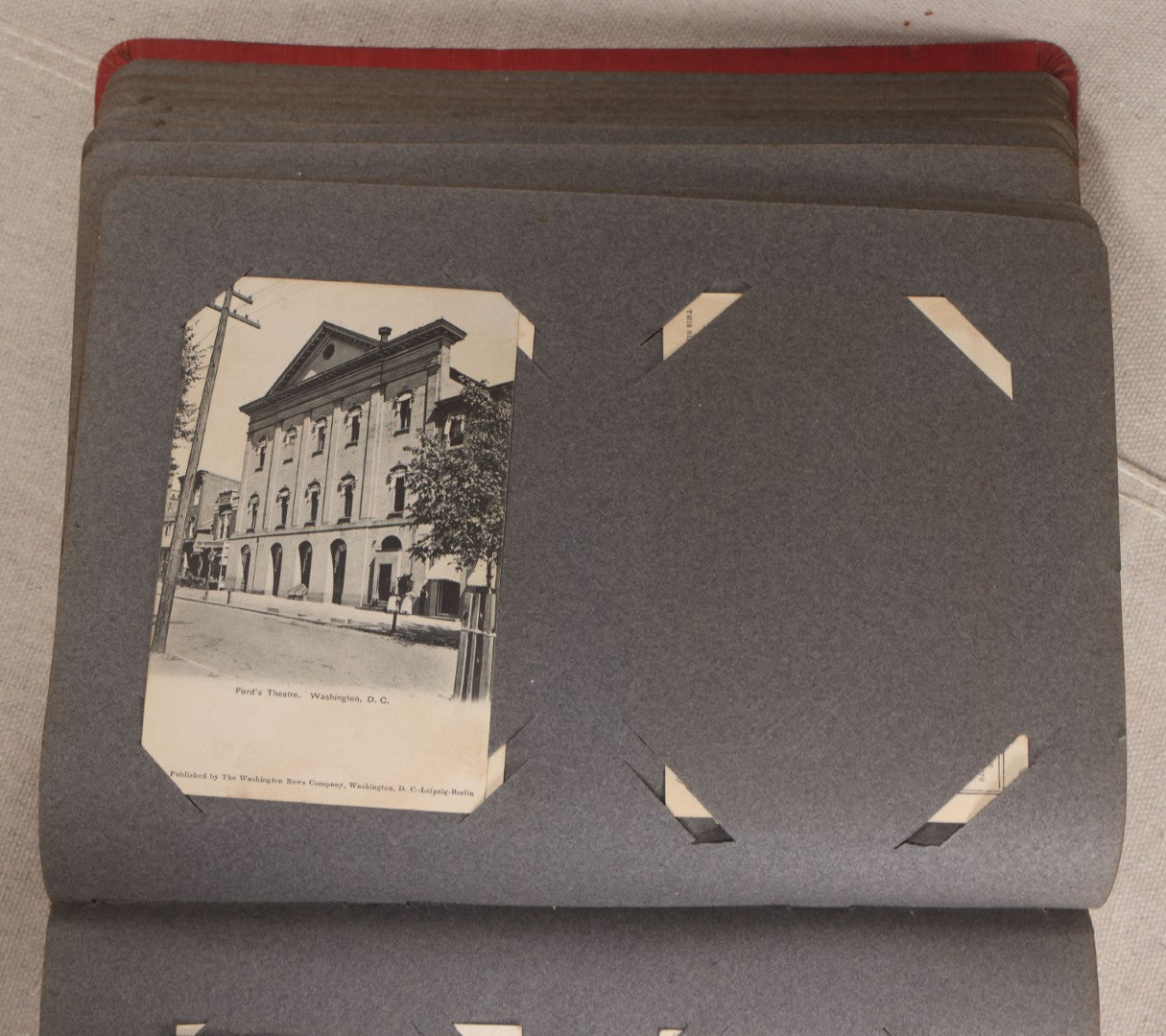 Lot 054 - Antique Postcard Album With Red Cover Containing Approximately 150 Antique And Vintage Postcards, New England, Holidays Including Christmas And Easter, Domestic, And International Subjects