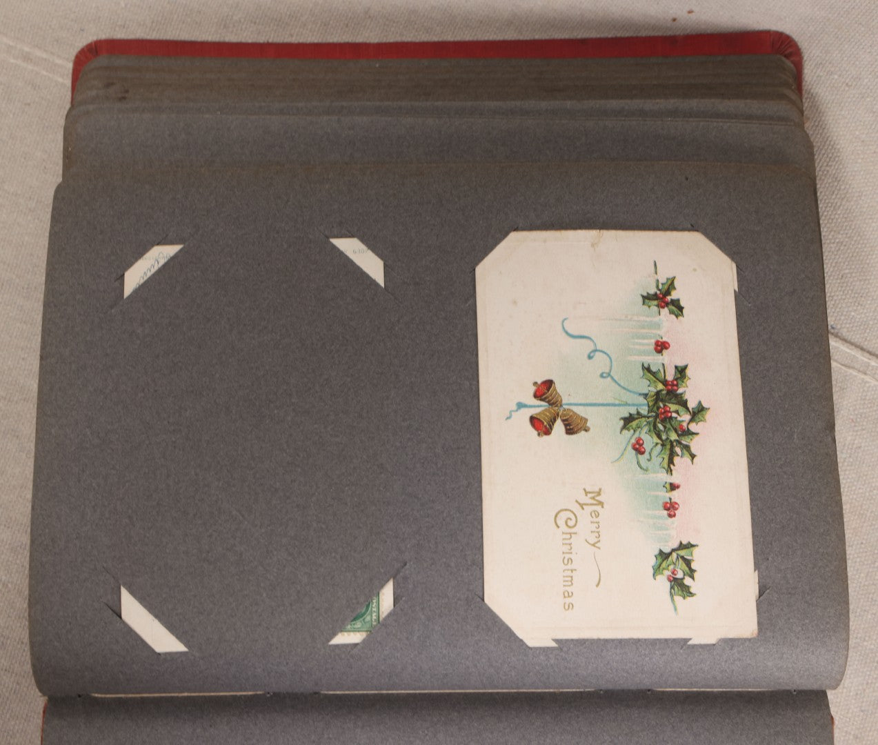 Lot 054 - Antique Postcard Album With Red Cover Containing Approximately 150 Antique And Vintage Postcards, New England, Holidays Including Christmas And Easter, Domestic, And International Subjects
