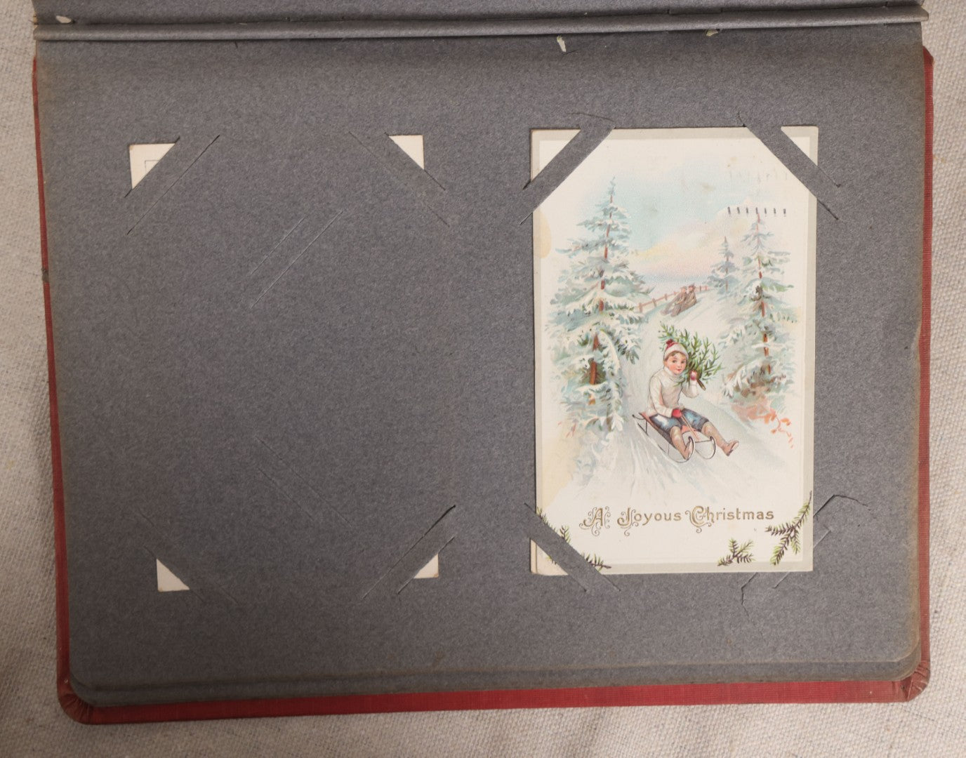 Lot 054 - Antique Postcard Album With Red Cover Containing Approximately 150 Antique And Vintage Postcards, New England, Holidays Including Christmas And Easter, Domestic, And International Subjects