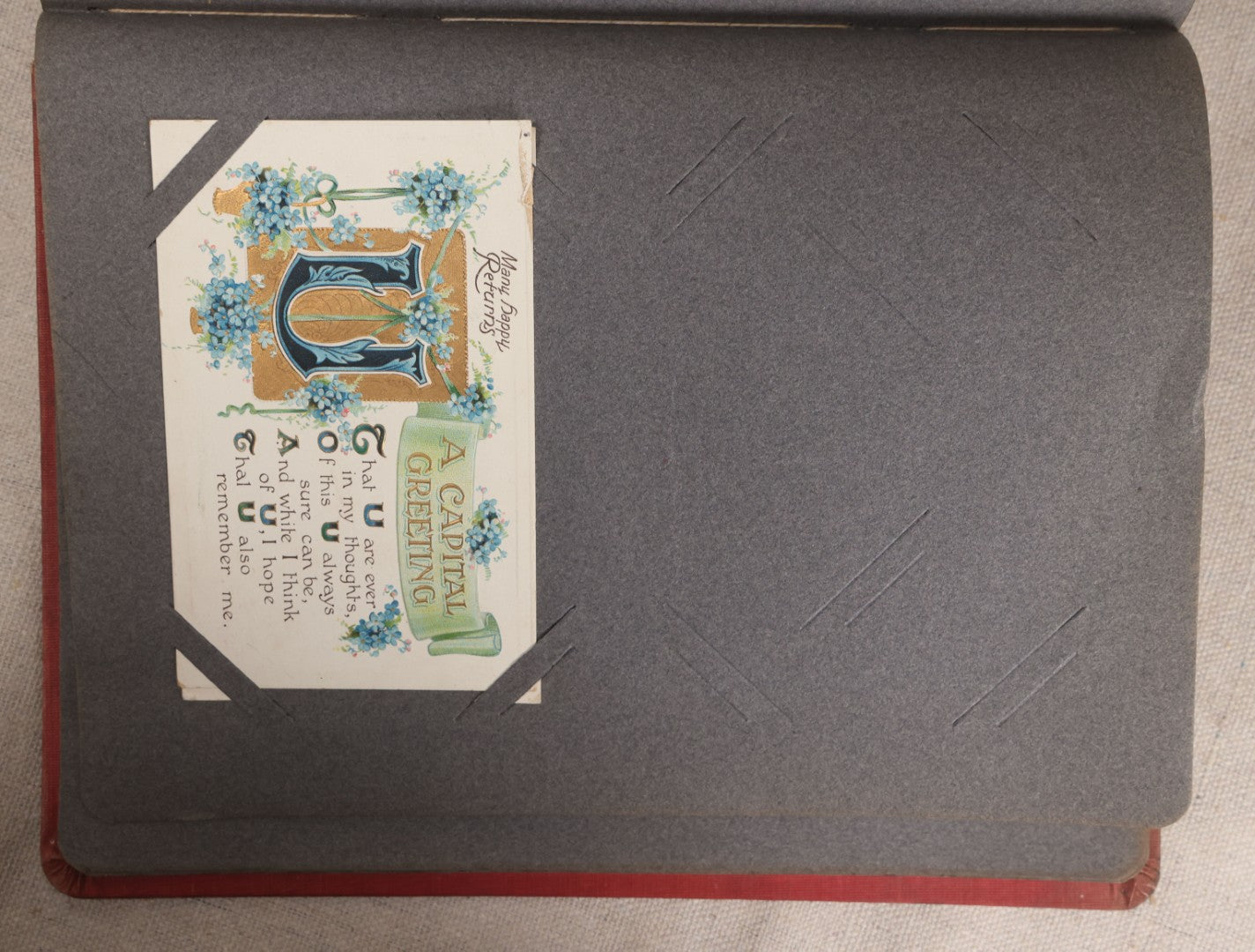 Lot 054 - Antique Postcard Album With Red Cover Containing Approximately 150 Antique And Vintage Postcards, New England, Holidays Including Christmas And Easter, Domestic, And International Subjects