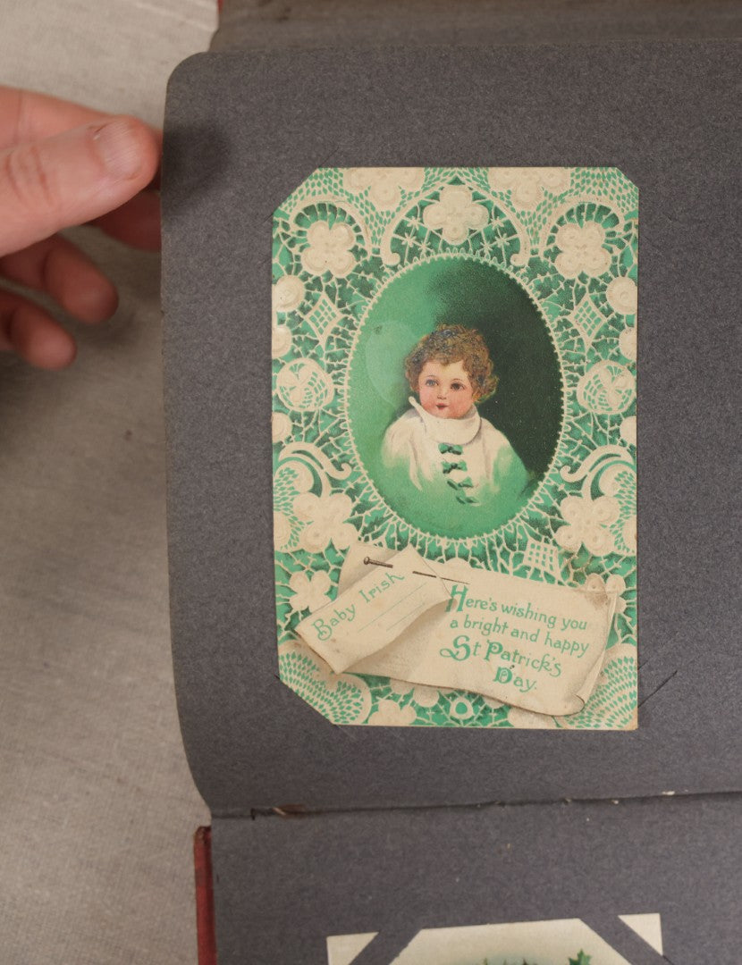 Lot 054 - Antique Postcard Album With Red Cover Containing Approximately 150 Antique And Vintage Postcards, New England, Holidays Including Christmas And Easter, Domestic, And International Subjects