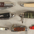 Lot 055 - Grouping Of Seven Vintage Pocket Knives Including Barlow, Multi-Tool With Corkscrew, And Air Express Advertising Knife