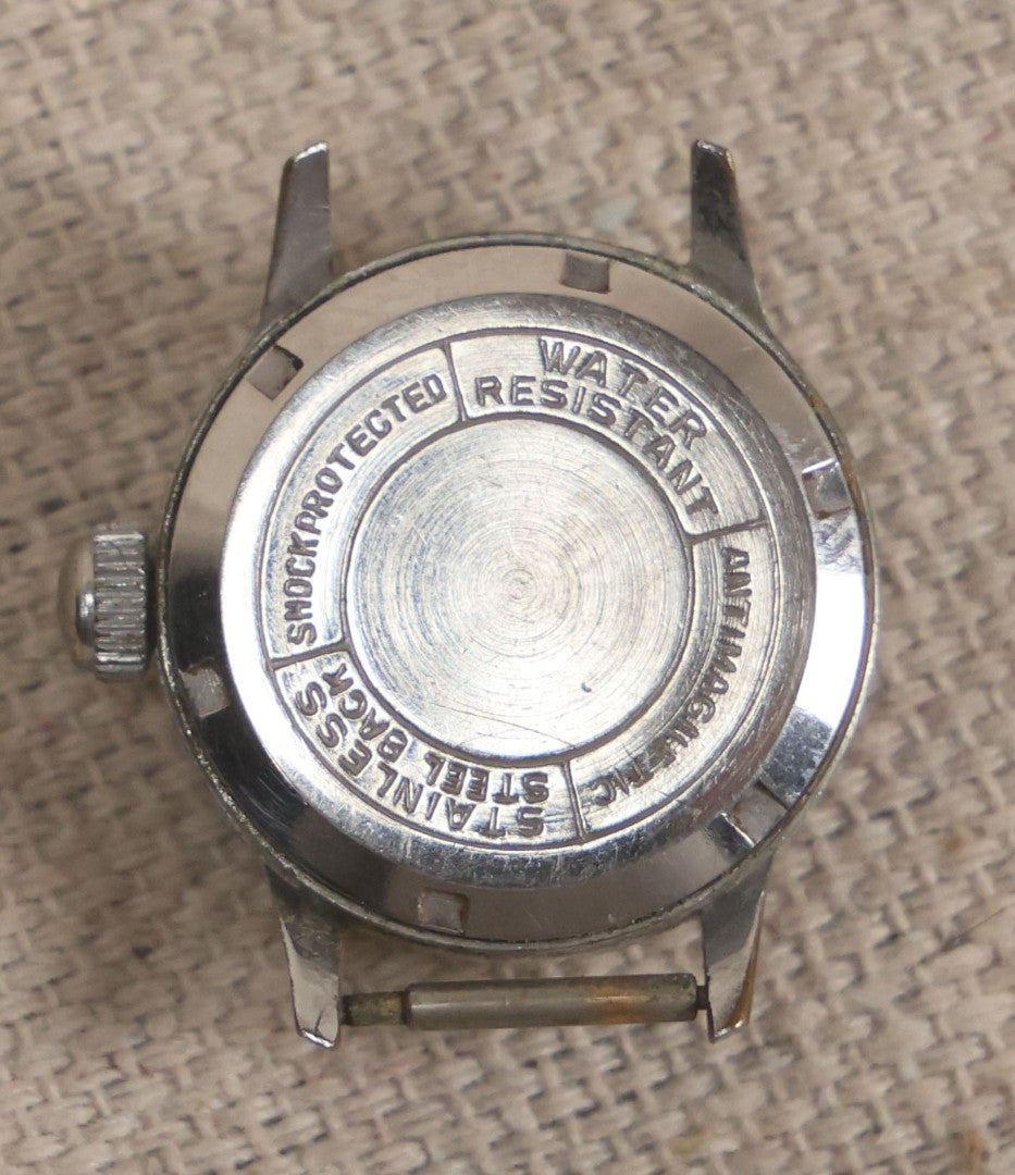 Lot 058 - Grouping Of Nine Vintage Wristwatches For Parts Or Repair Including Besco, Emerson, Rouen, Harmanette, Hanover, Bouquet, And Westclox, Many Swiss Make