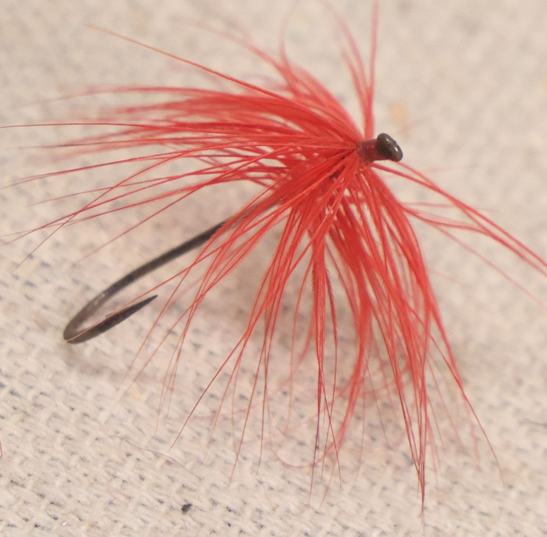 Lot 059 - Grouping Of 12 Vintage Fly Fishing Poppers With Painted Bodies And Feather Tails