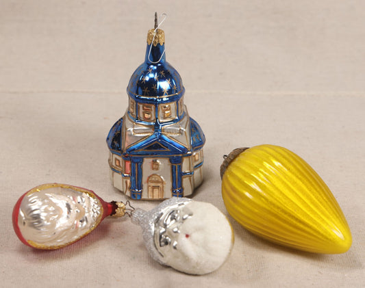 Lot 062 - Grouping Of Four Vintage Blown Glass Christmas Ornaments Including Two Figural Santa Claus Heads, Church, And Gold Ribbed Teardrop